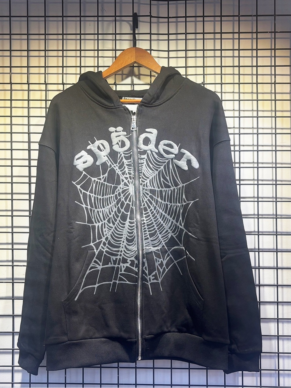 Black Zip Hoodie with Silver Spiderweb Graphic and 'spöder' Text